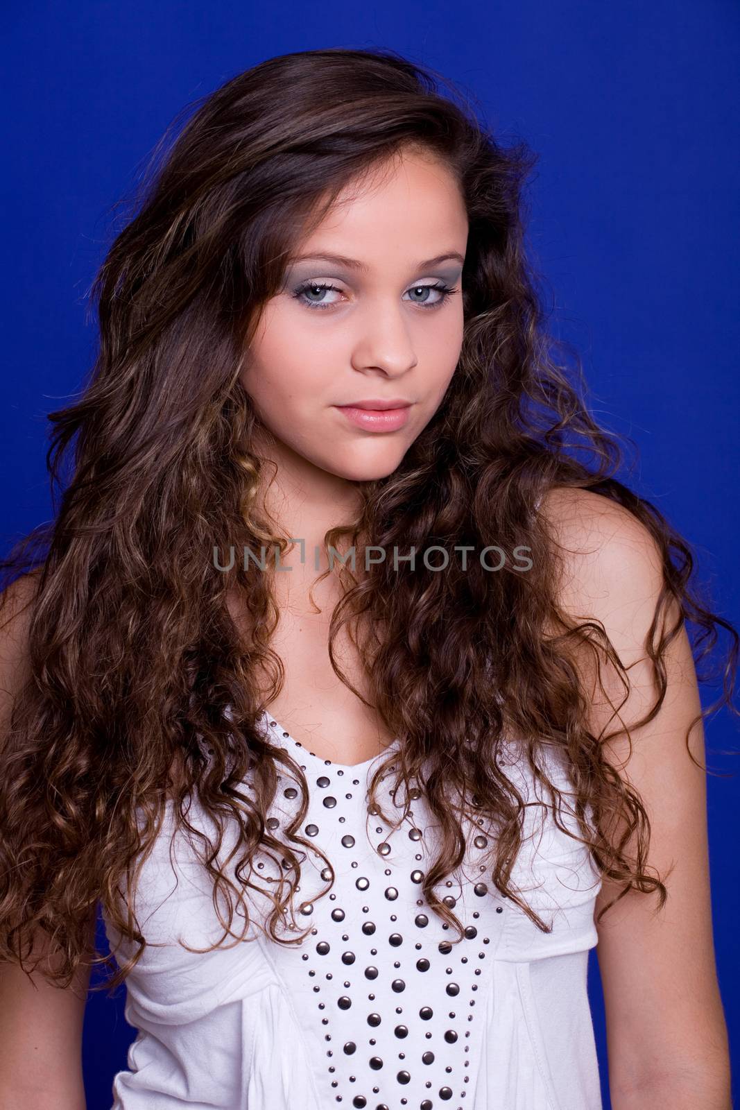 young beautiful woman, on a blue background