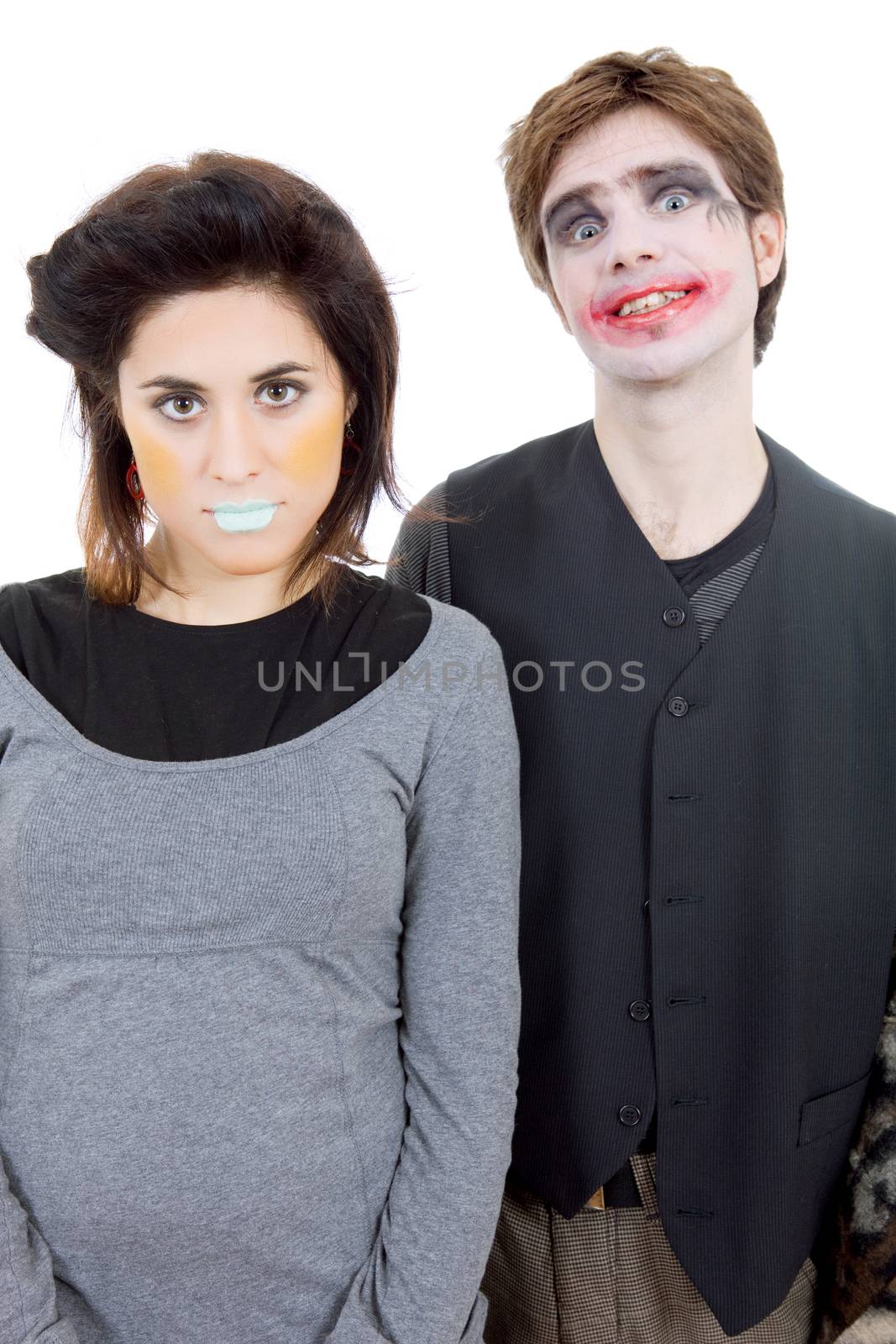 couple young people dressed as clowns, isolated