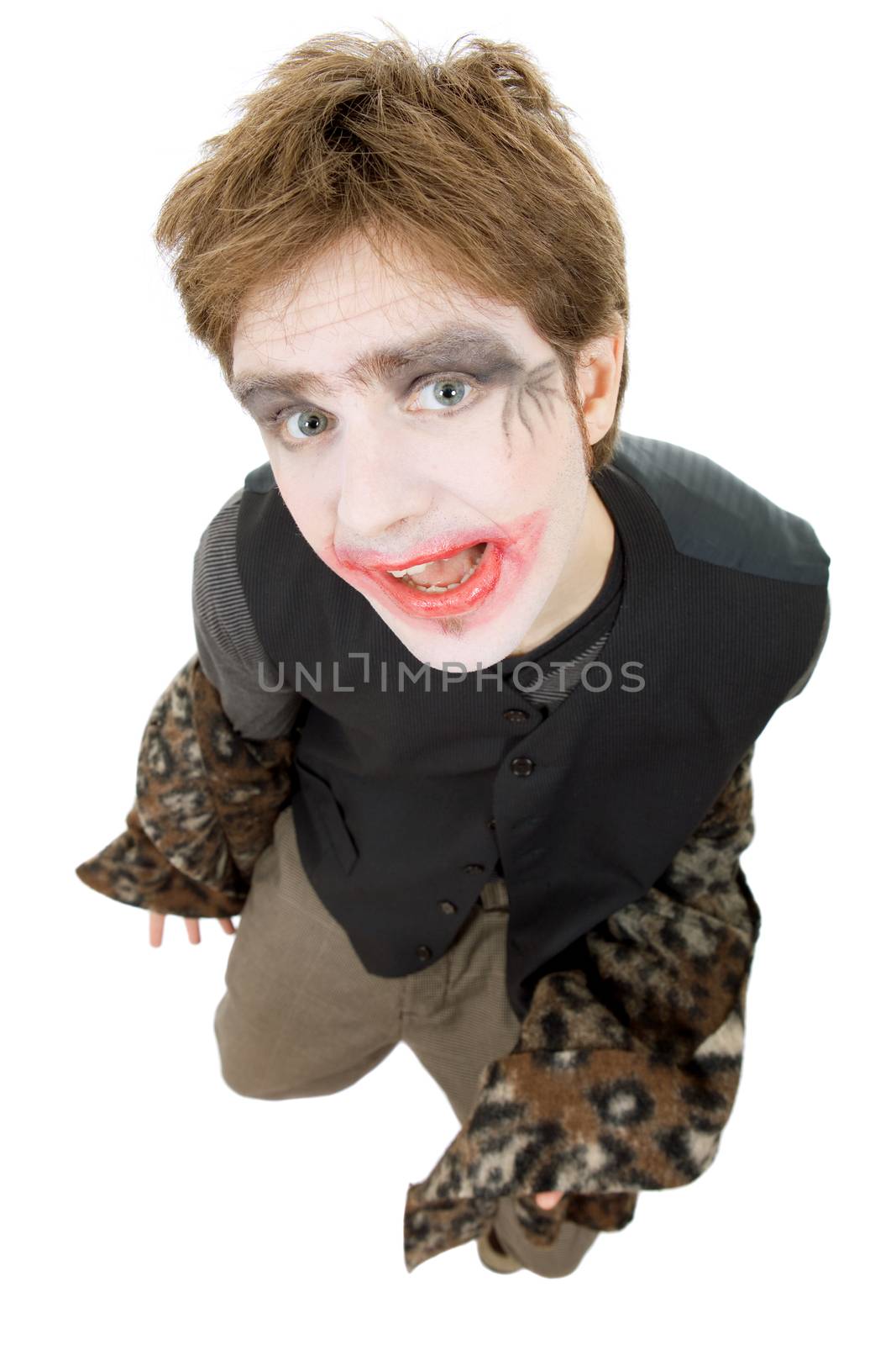 young man dressed as joker, isolated on white