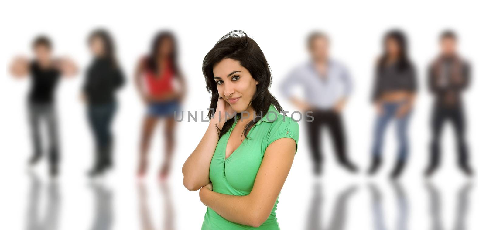 A beautiful young girl in front of a group of people, isolated