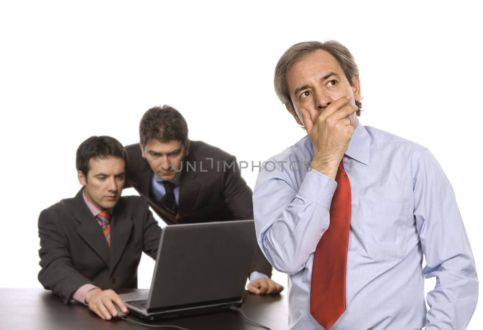 boss and two workers at a desk, isolated on white