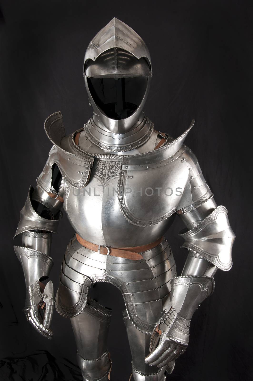 Armour of the medieval knight. Metal protection of the soldier against the weapon of the opponent