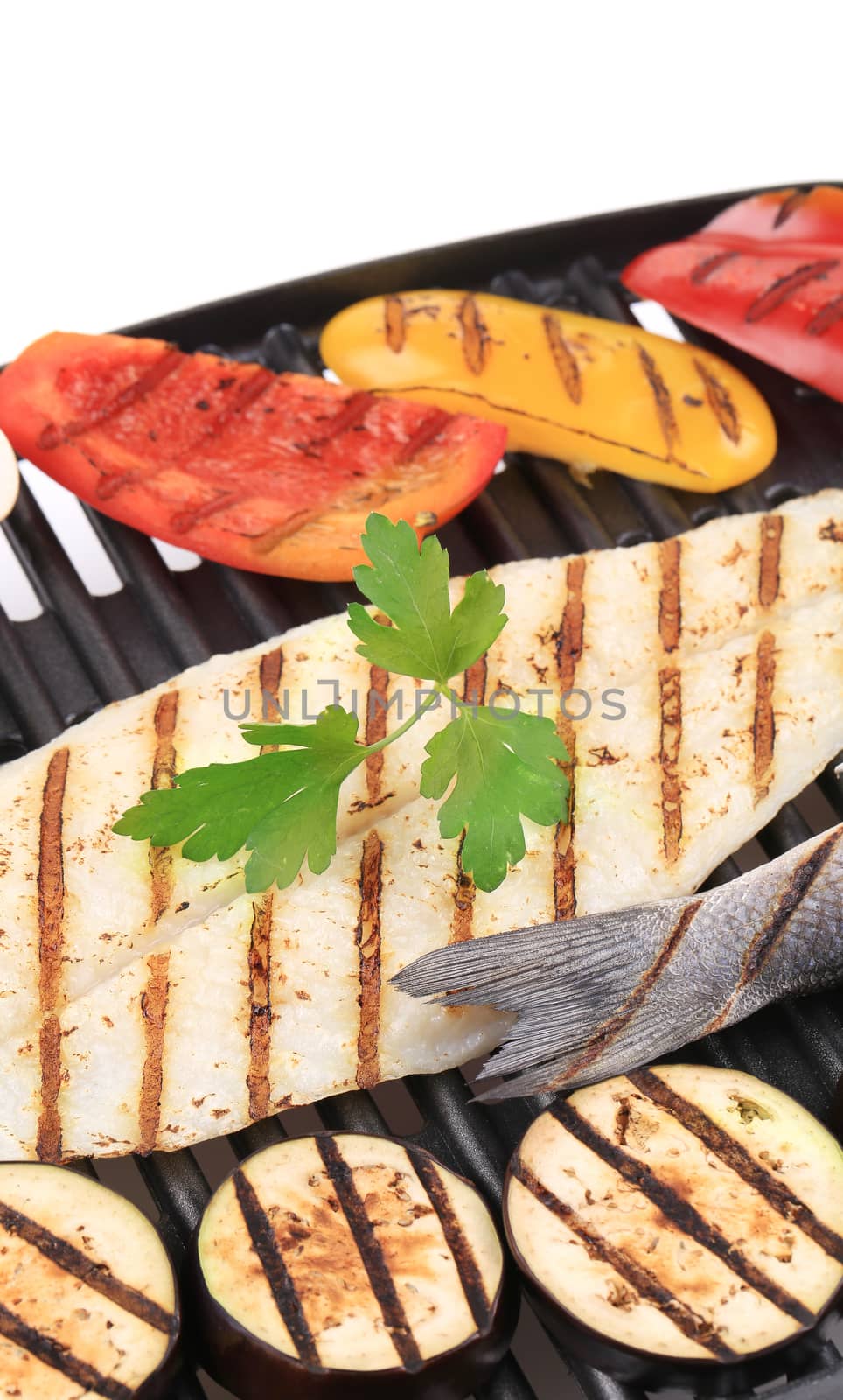 Grilled fillet of pangasius. Close up. Whole background.