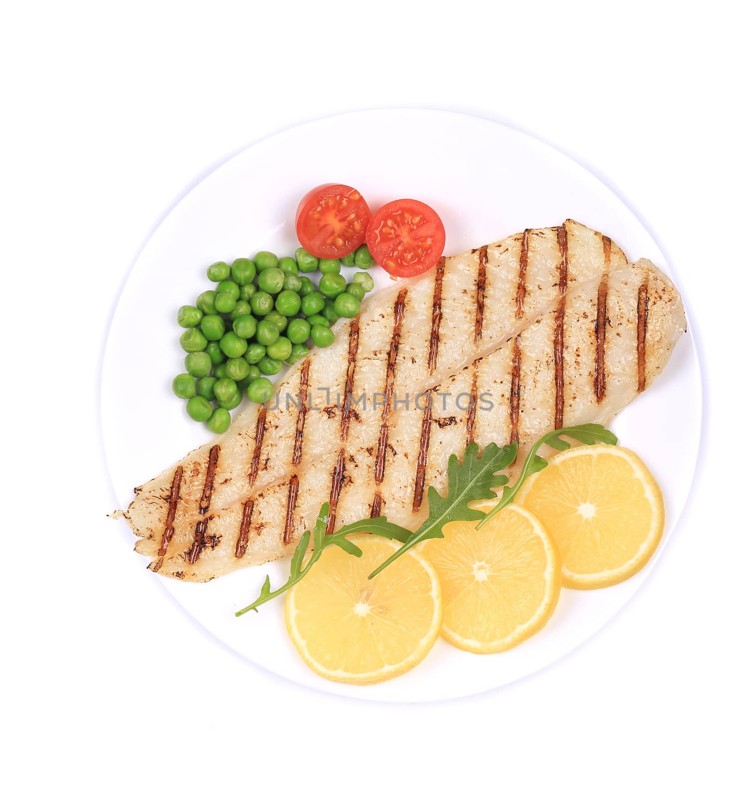 Pangasius fillet on plate. Isolated on a white background.