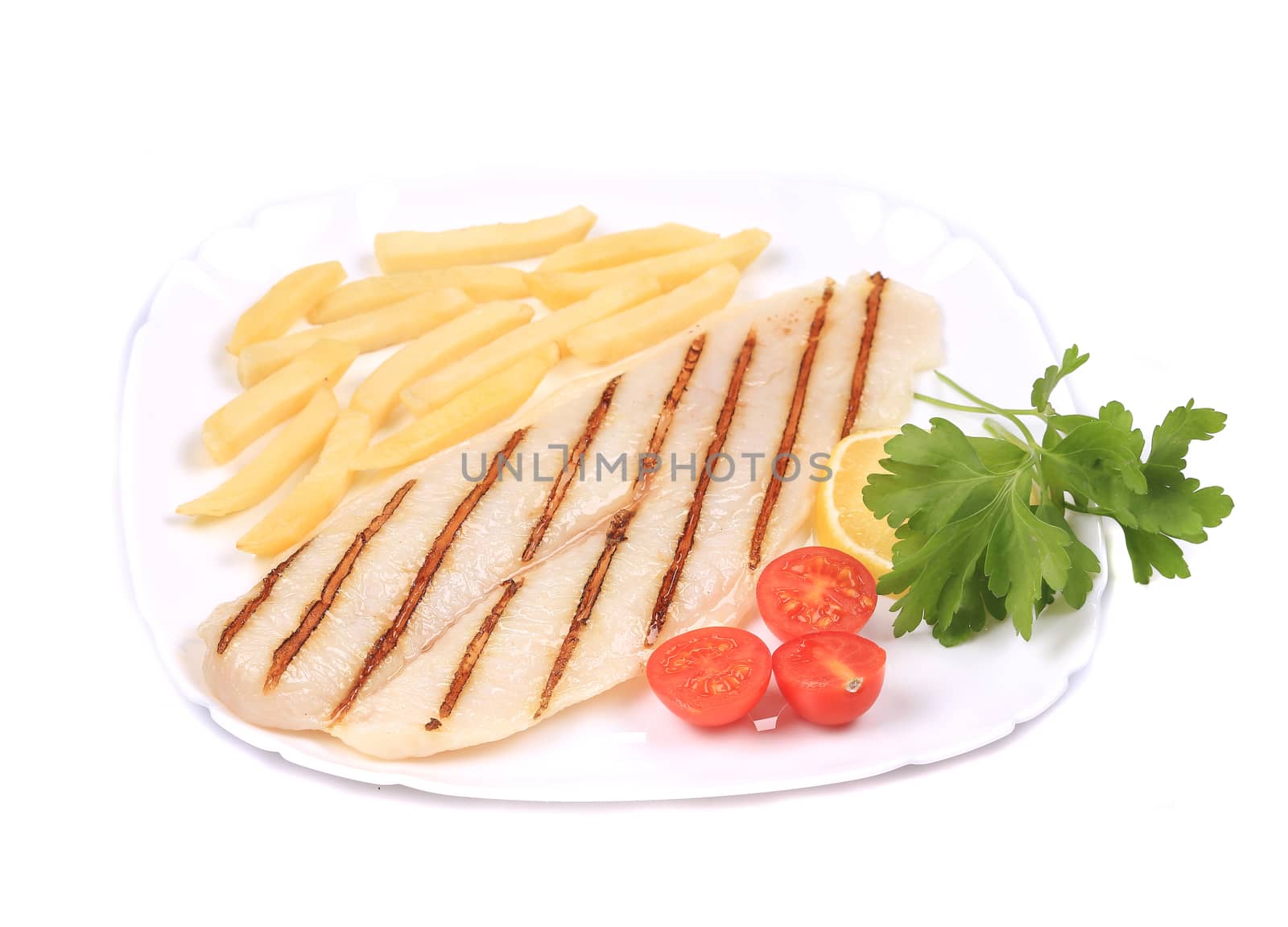 Grilled pangasius steak with vegentables. Isolated on a white background.