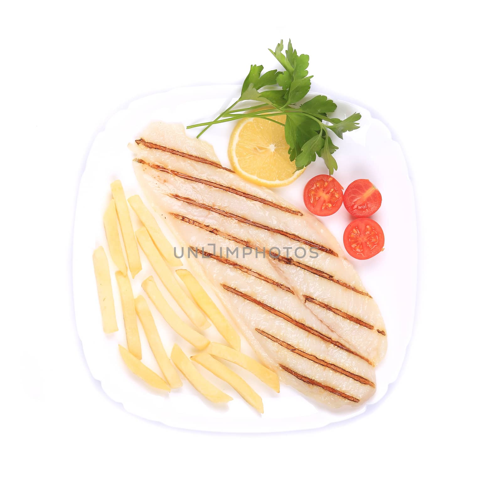 Grilled pangasius steak with vegentables. Isolated on a white background.