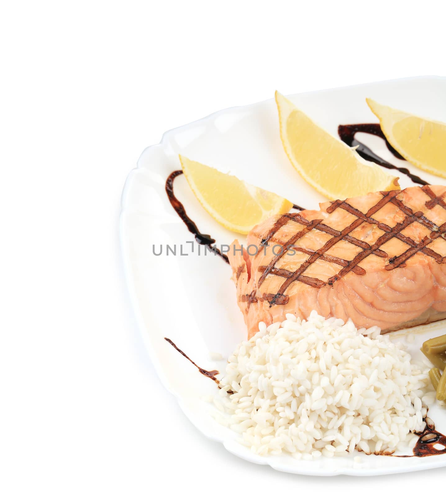 Lemon slices and salmon fillet. Whole background.