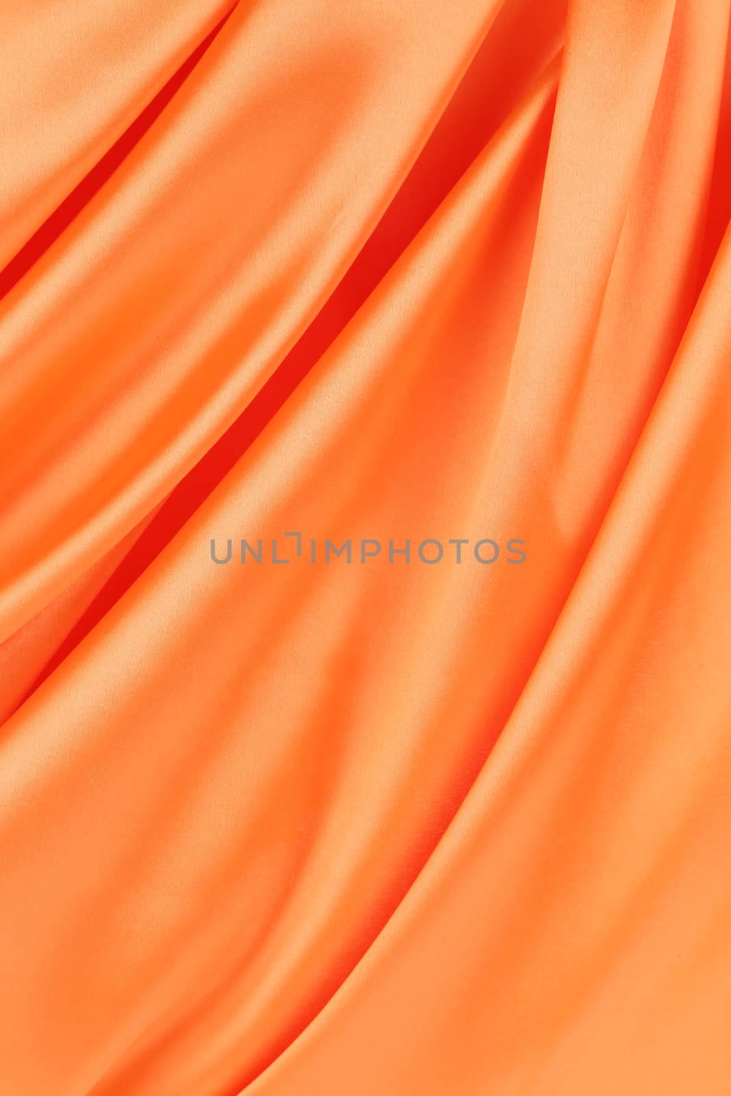 Series in orange fabric. Macro. Whole background.