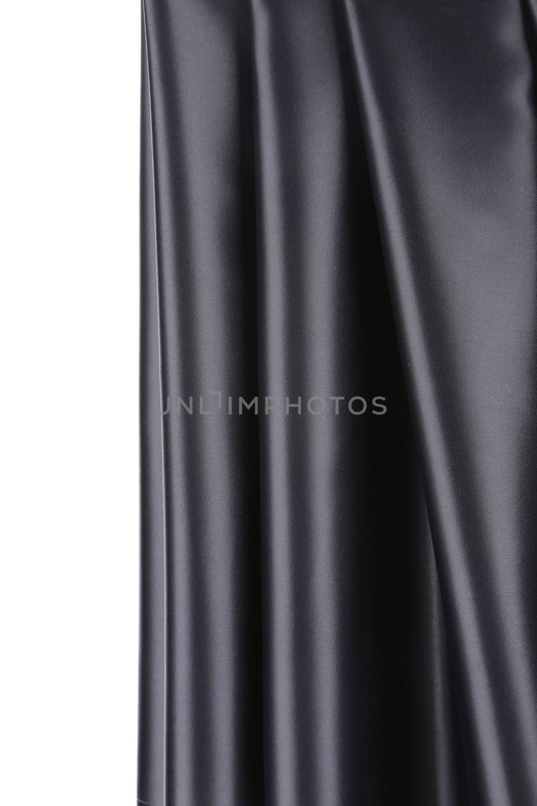Creases in black fabric. Close up. Whole background.