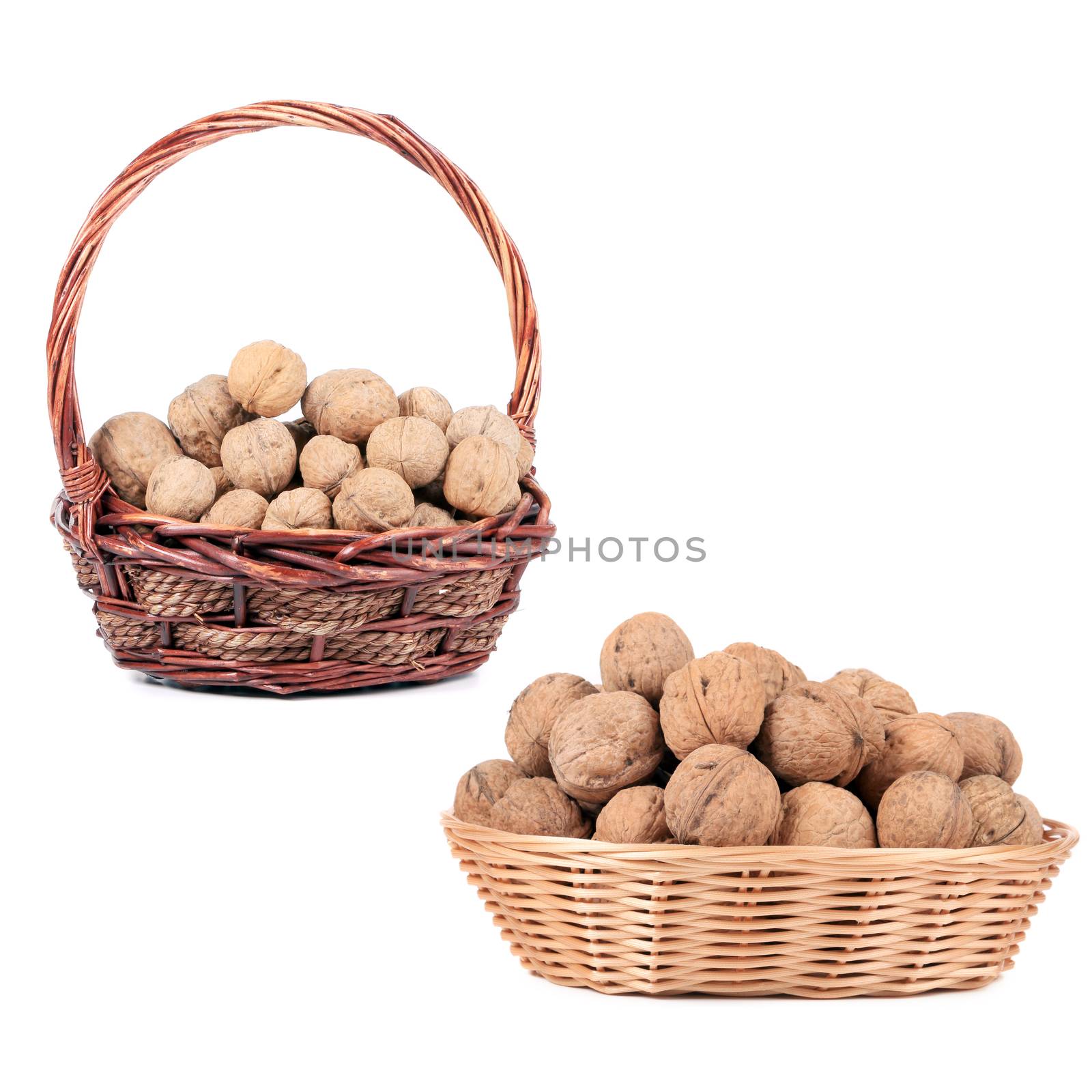 Two basket with walnuts. Isolated on a white background.