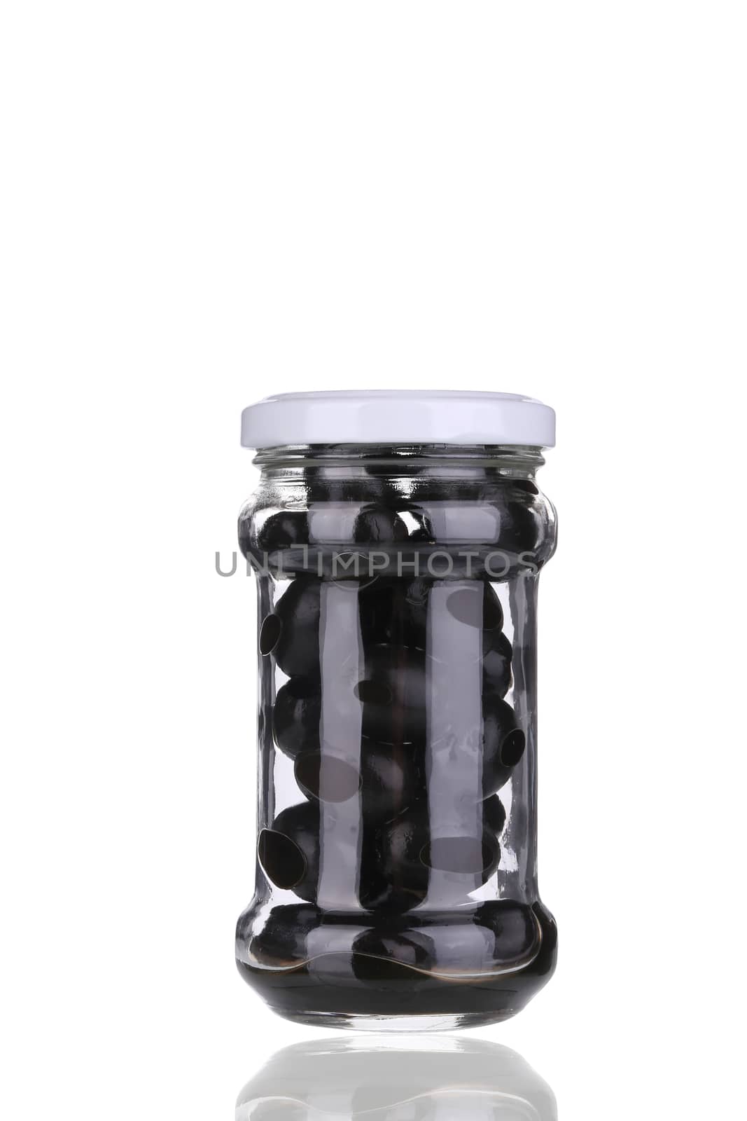 Black olives in a jar. Isolated on a white background.