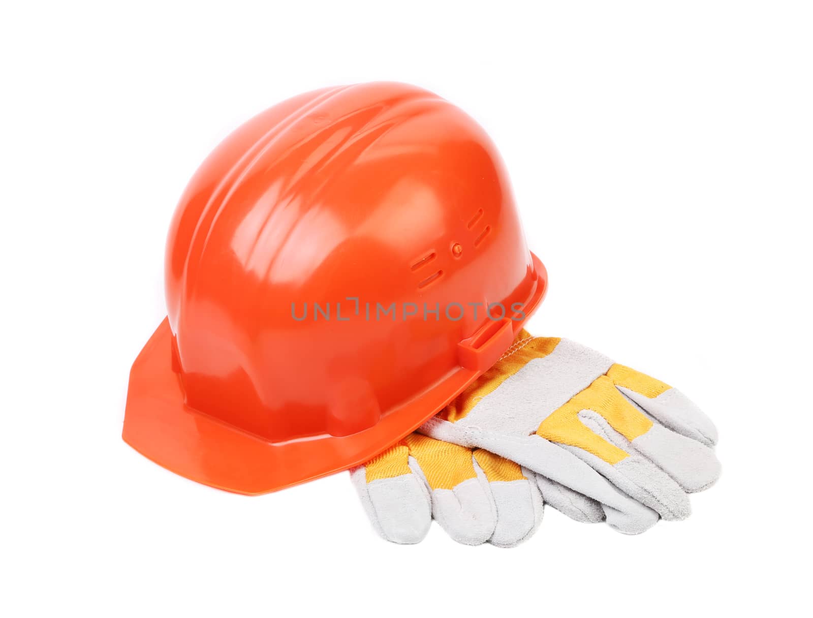 Red hard hat with leather gloves. Isolated on a white background.
