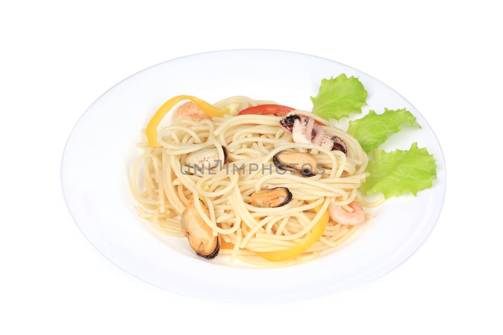 Seafood salad with spaghetti. Isolated on a white background.