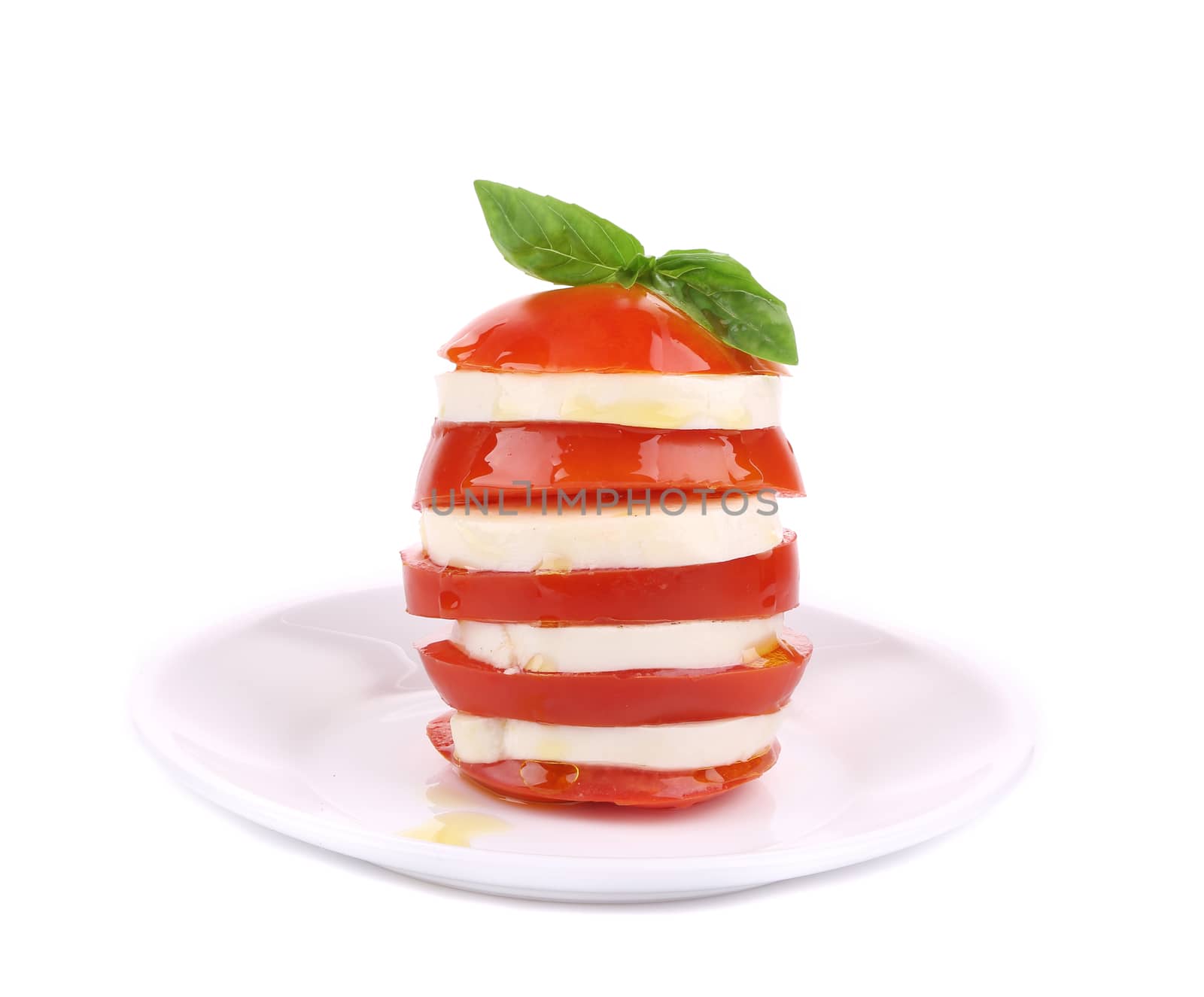 Caprese salad. Isolated on a white background.
