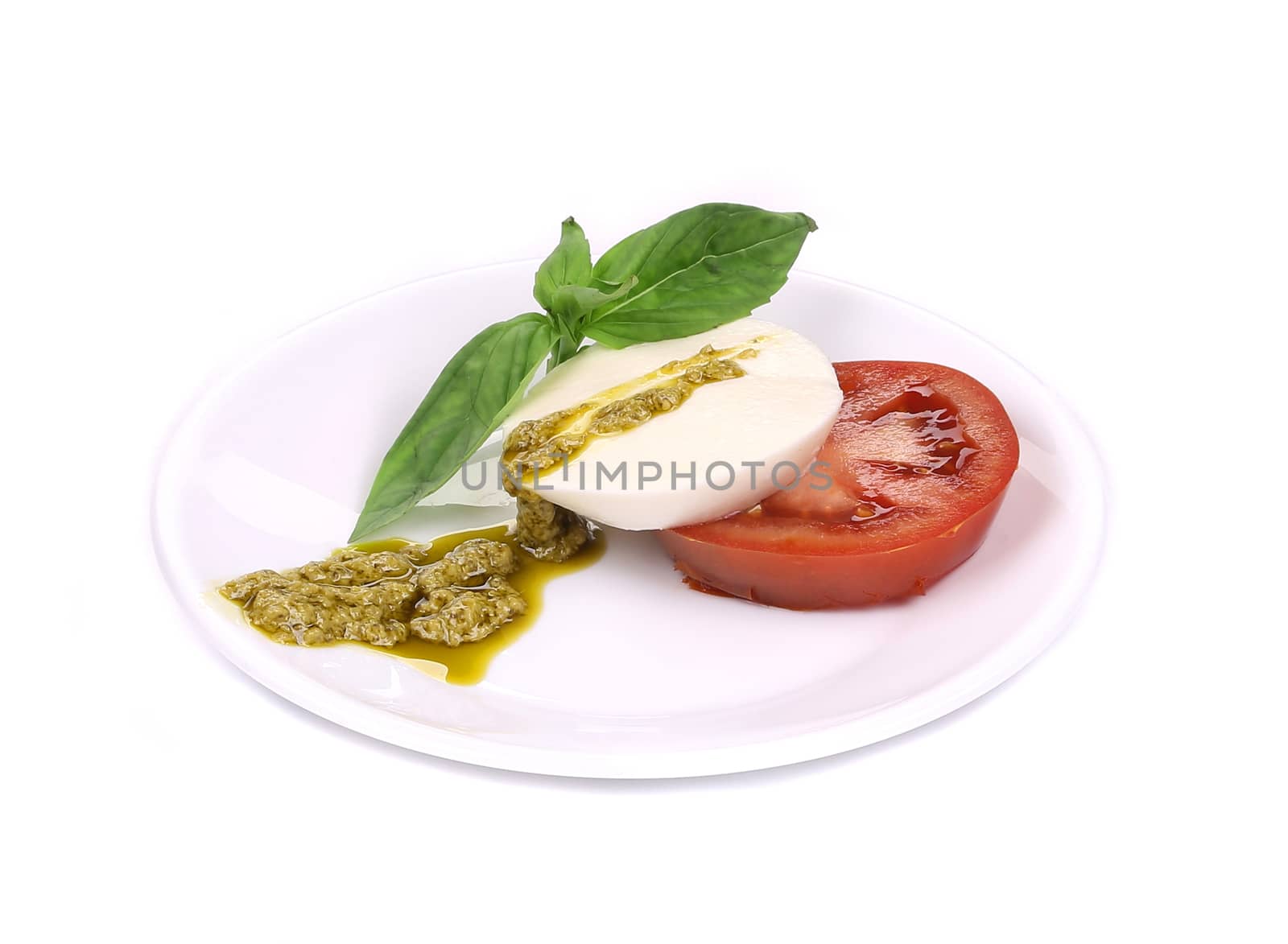 Caprese salad. Isolated on a white background.