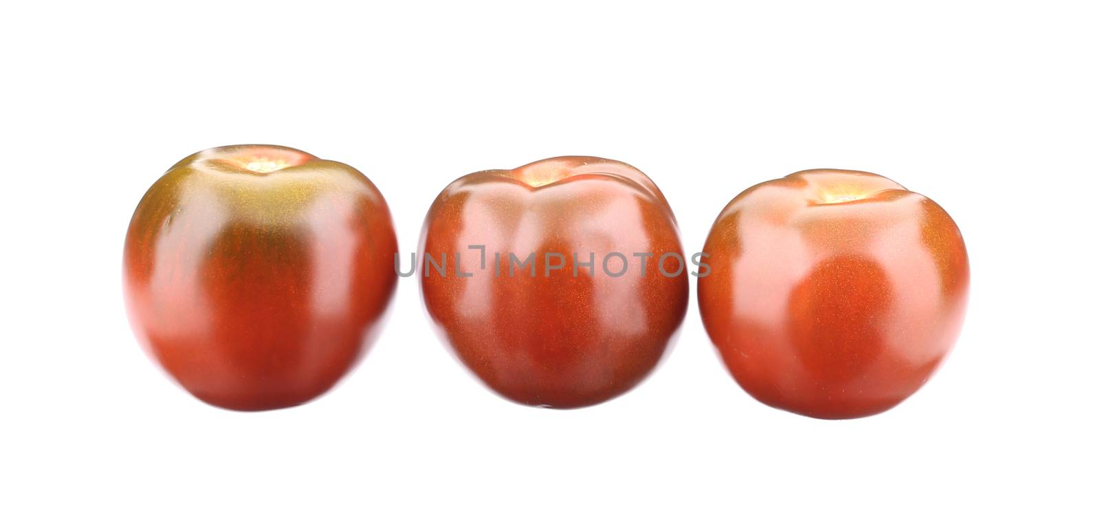 Close up of tomatoes. Isolated on a white background.