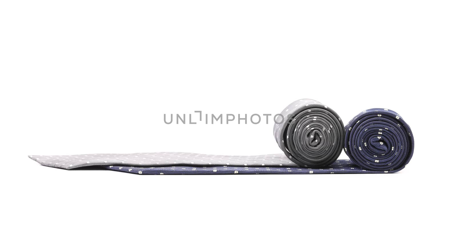 Folded gray and blue tie with white speck. Isolated on a white background.