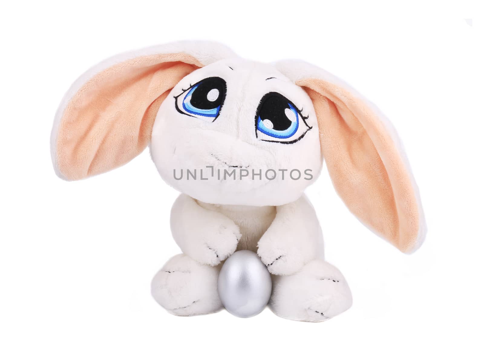 White easter toy rabbit with silver egg. Isolated on a white background.