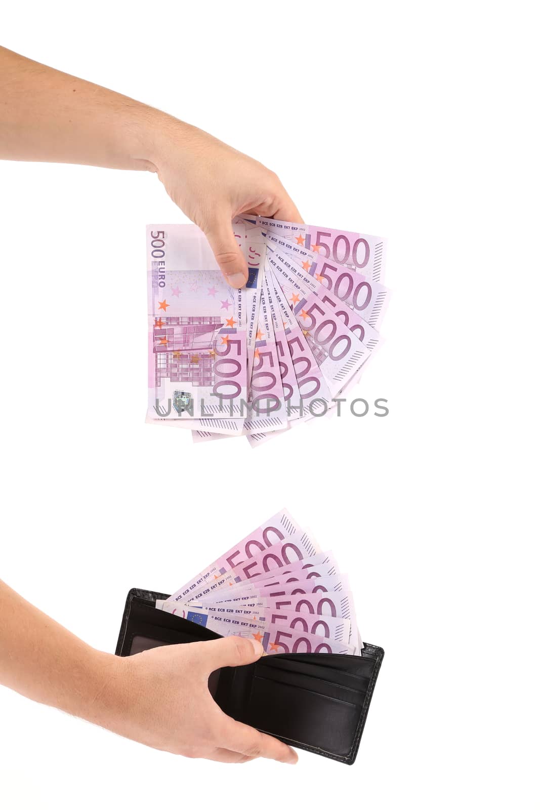 Hand with leather wallet and euro banknotes. by indigolotos