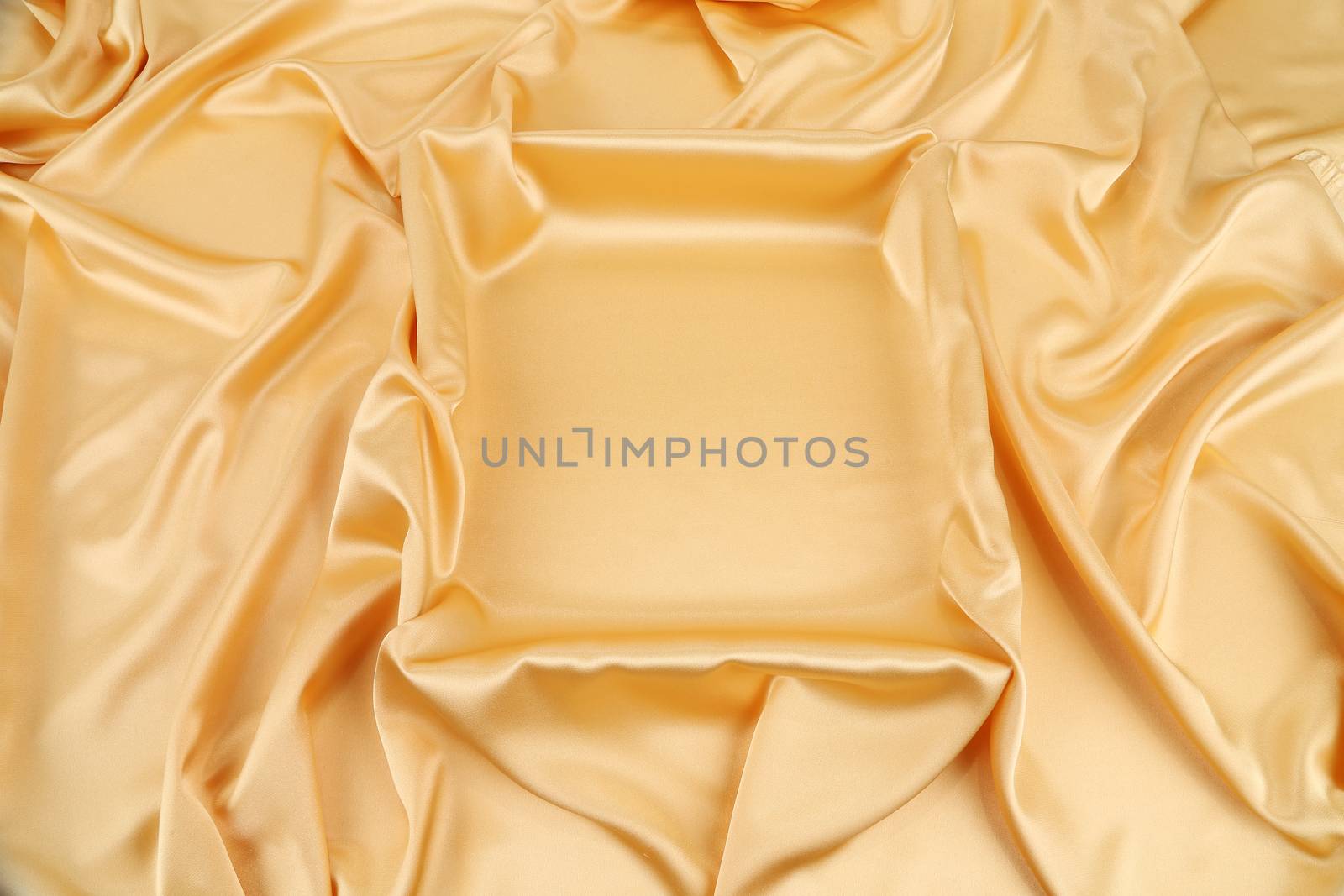 Gold silk drapery. Close up. Whole background.