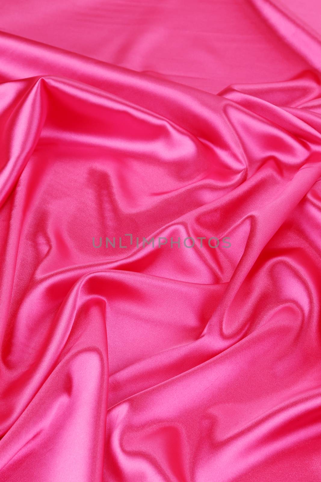 Pink silk drapery. Close up. Whole background.