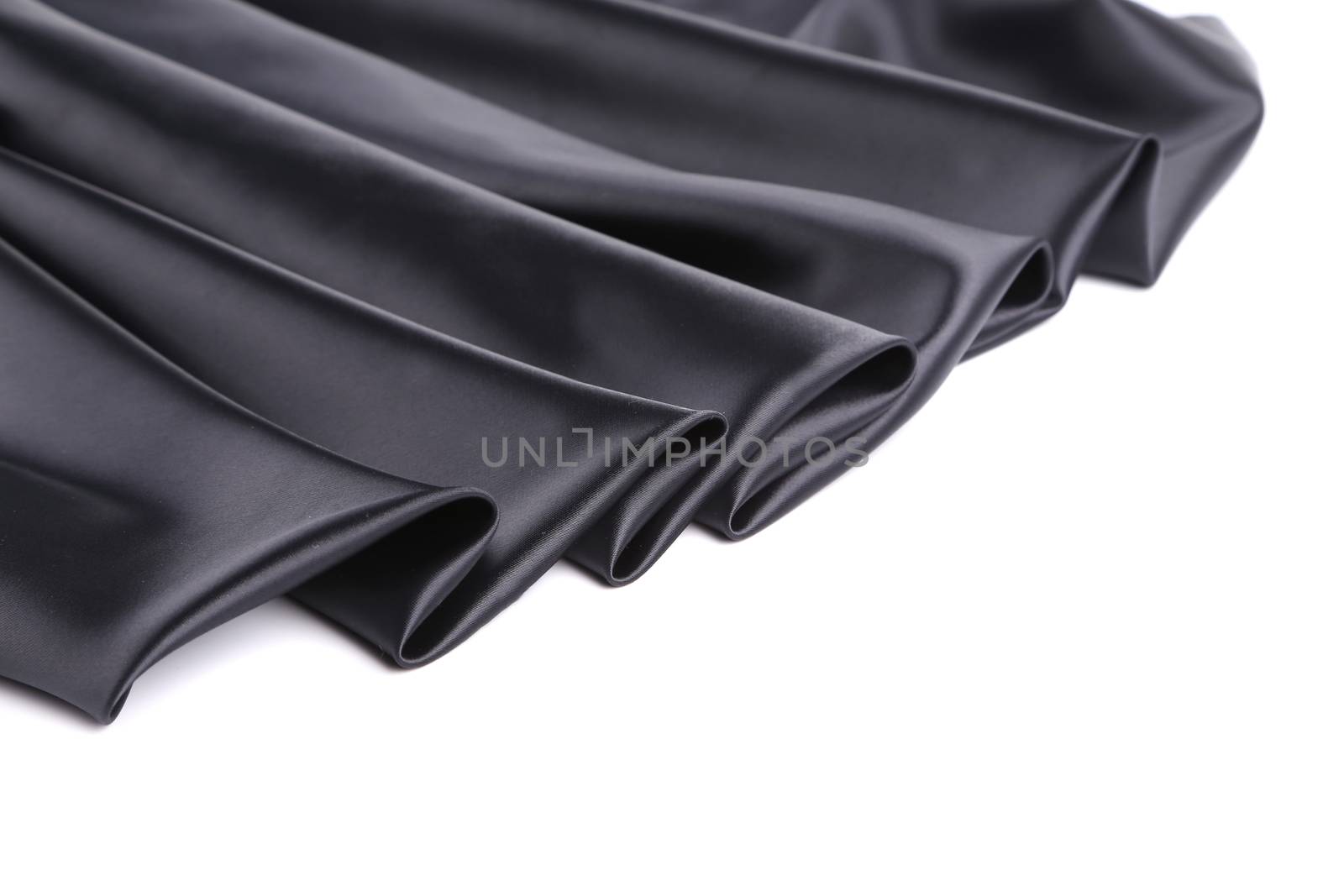 Black silk drapery. Close up. Whole background.