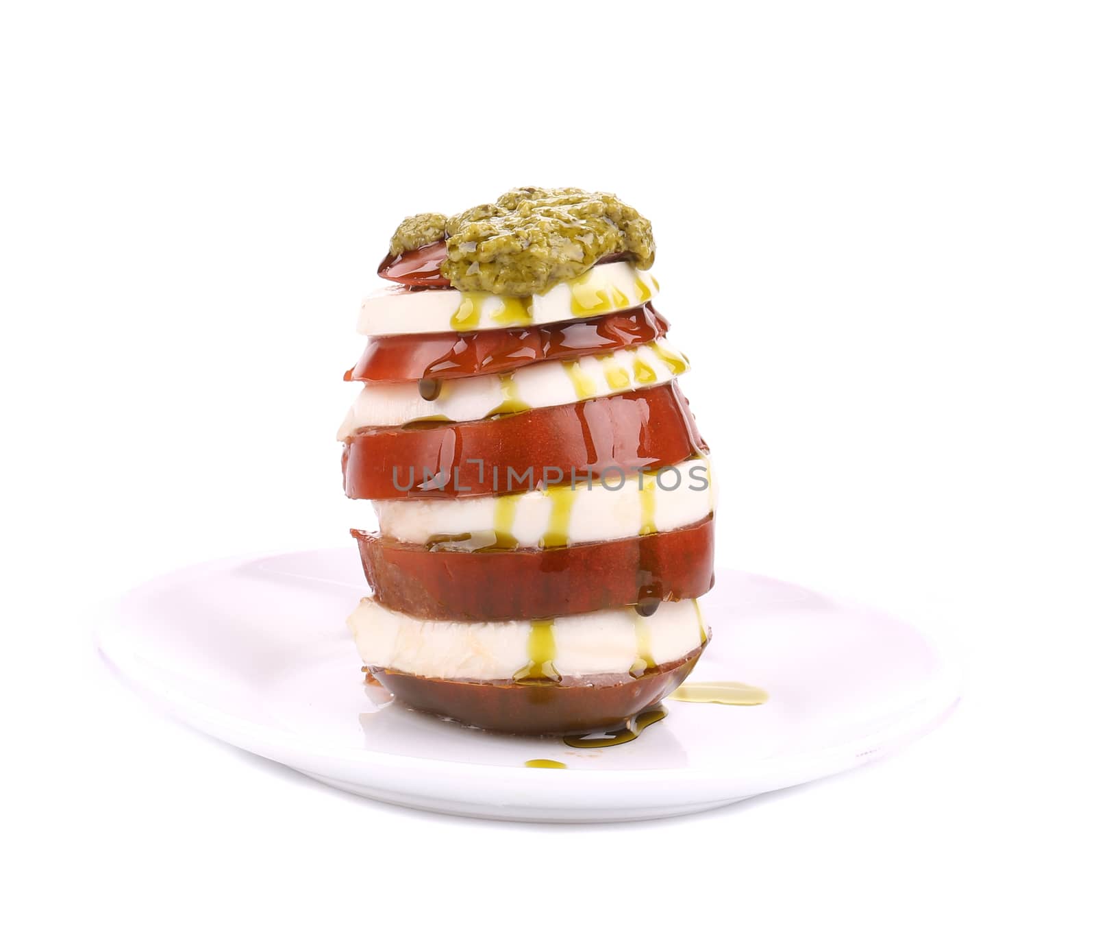 Tasty caprese salad. Isolated on a white background.
