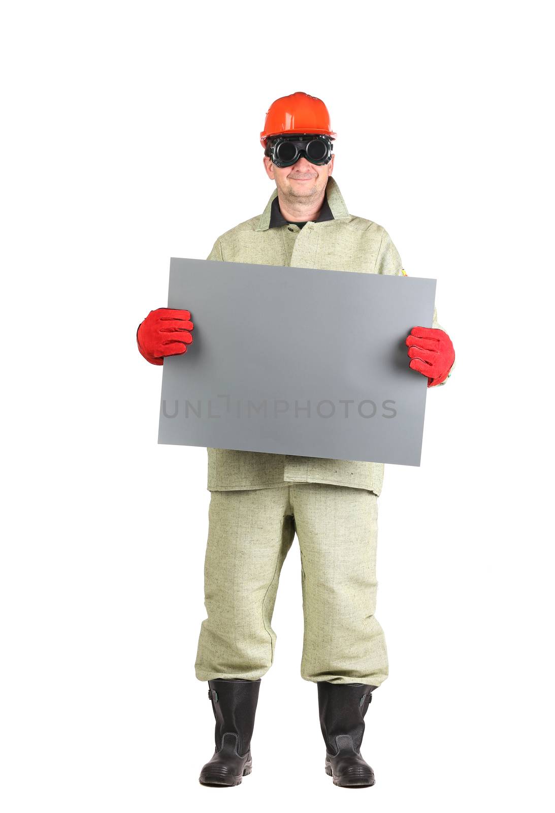 Welder in hard hat with paper. by indigolotos