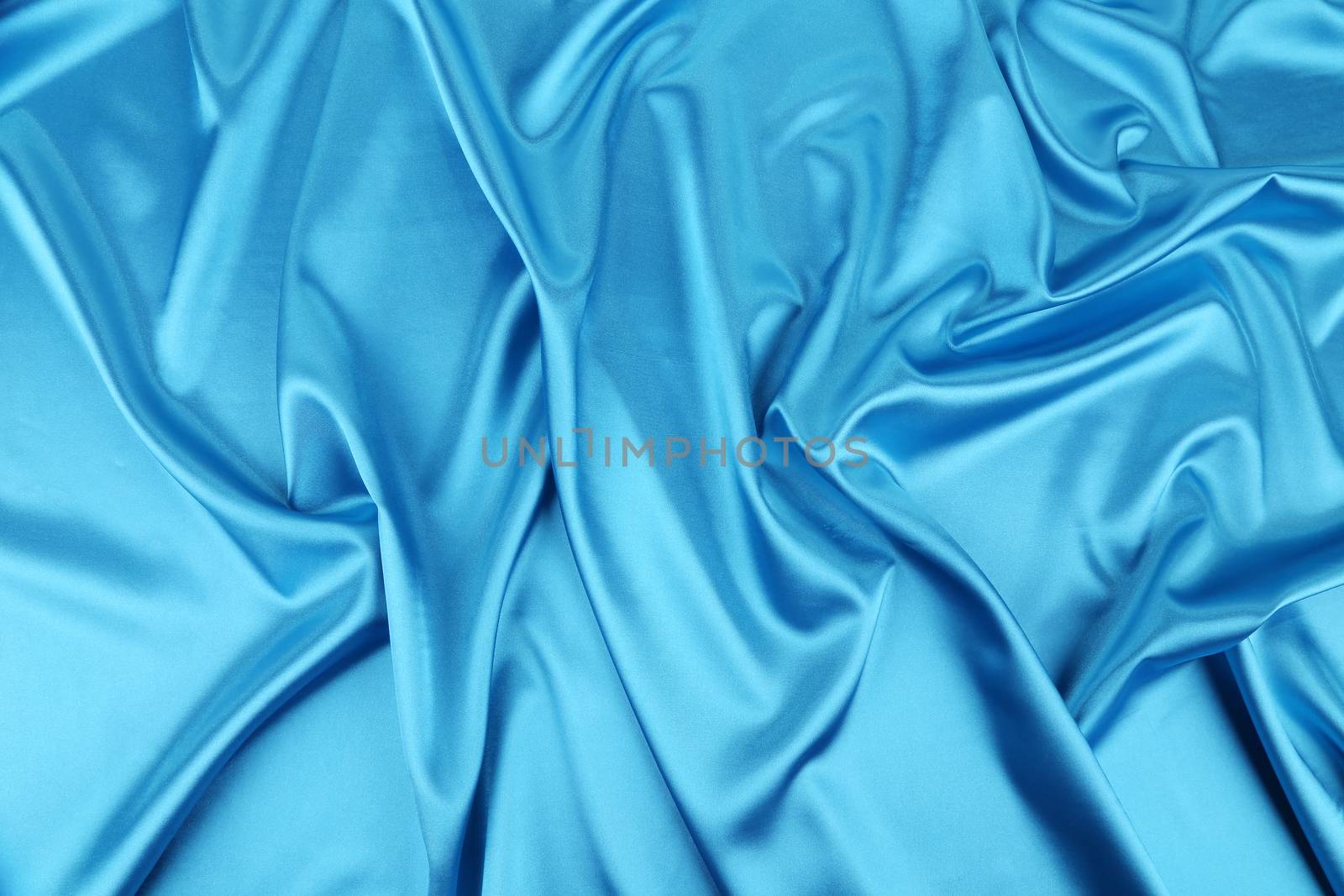 Blue silk background. Close up. Whole background.