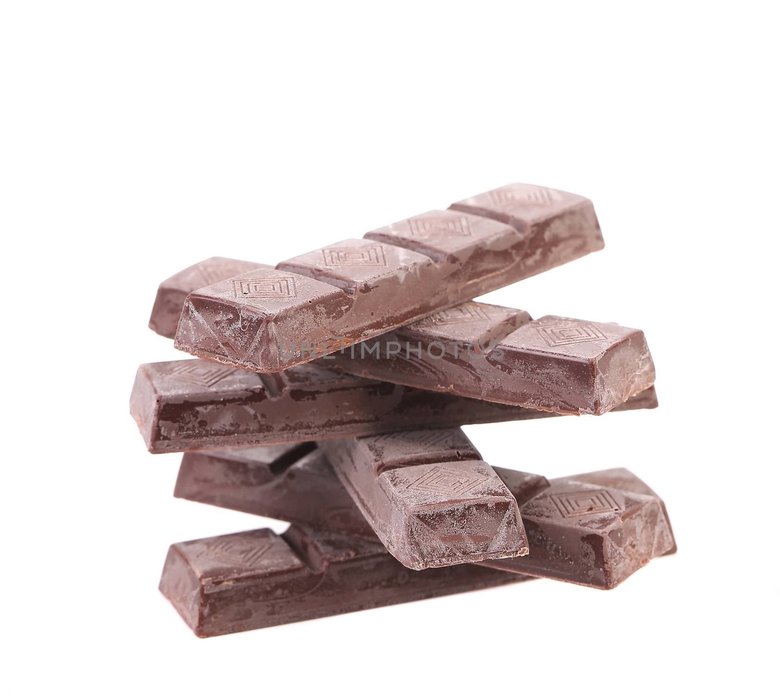 Stack of chocolate bars. Isolated on a white background.