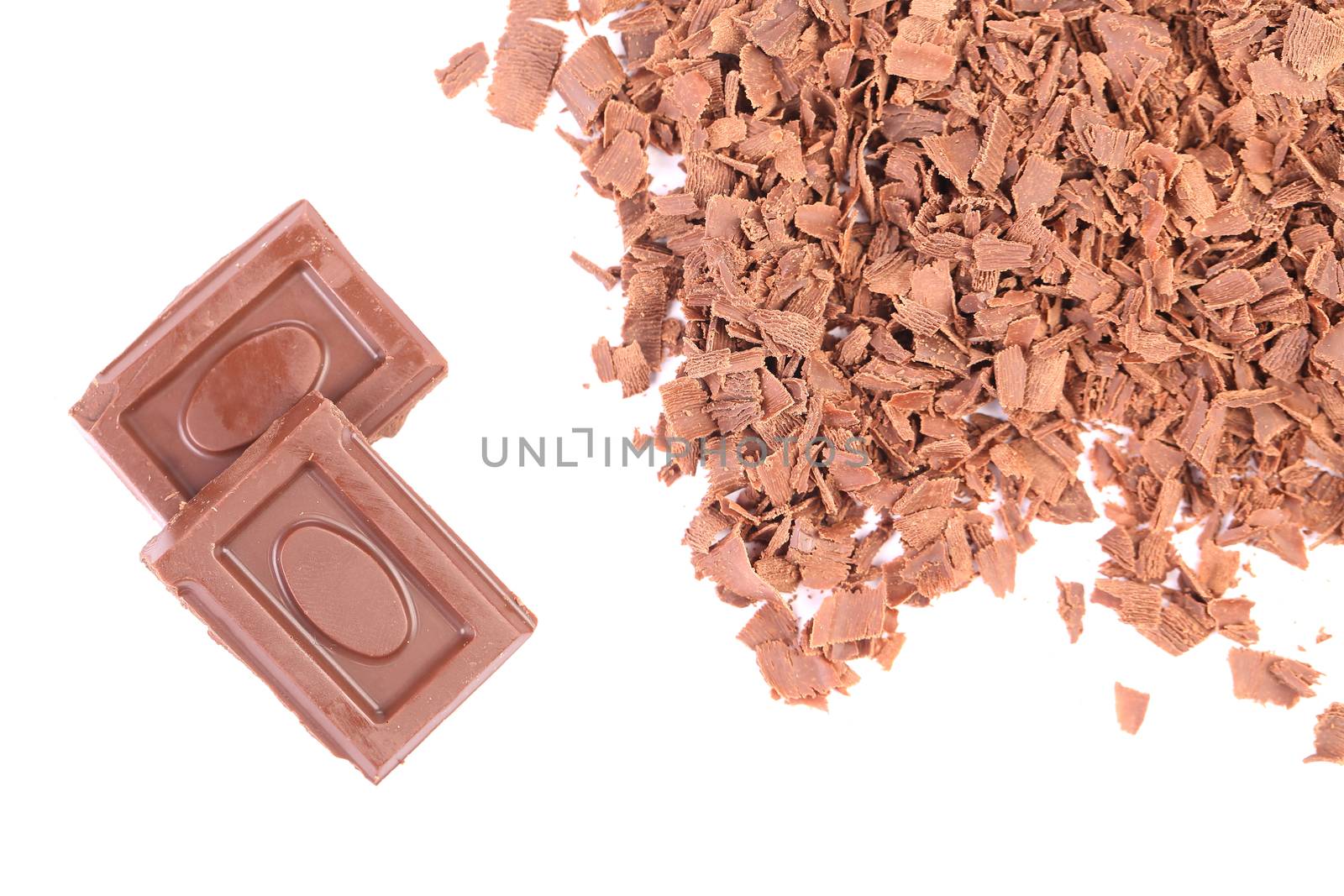 Chocolate bars and shavings. Isolated on a white background.