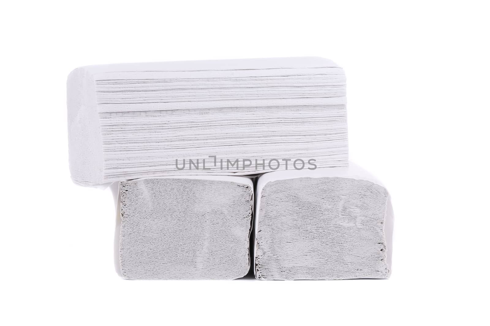 Stack of folded disposable papers. Isolated on a white background.