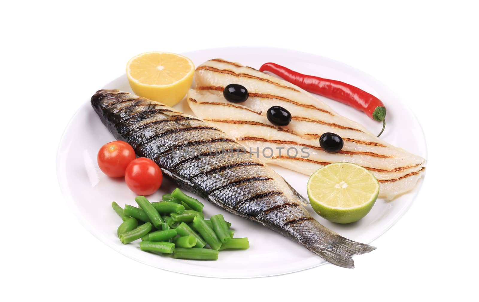 Fish and vegetables. Isolated on a white background.