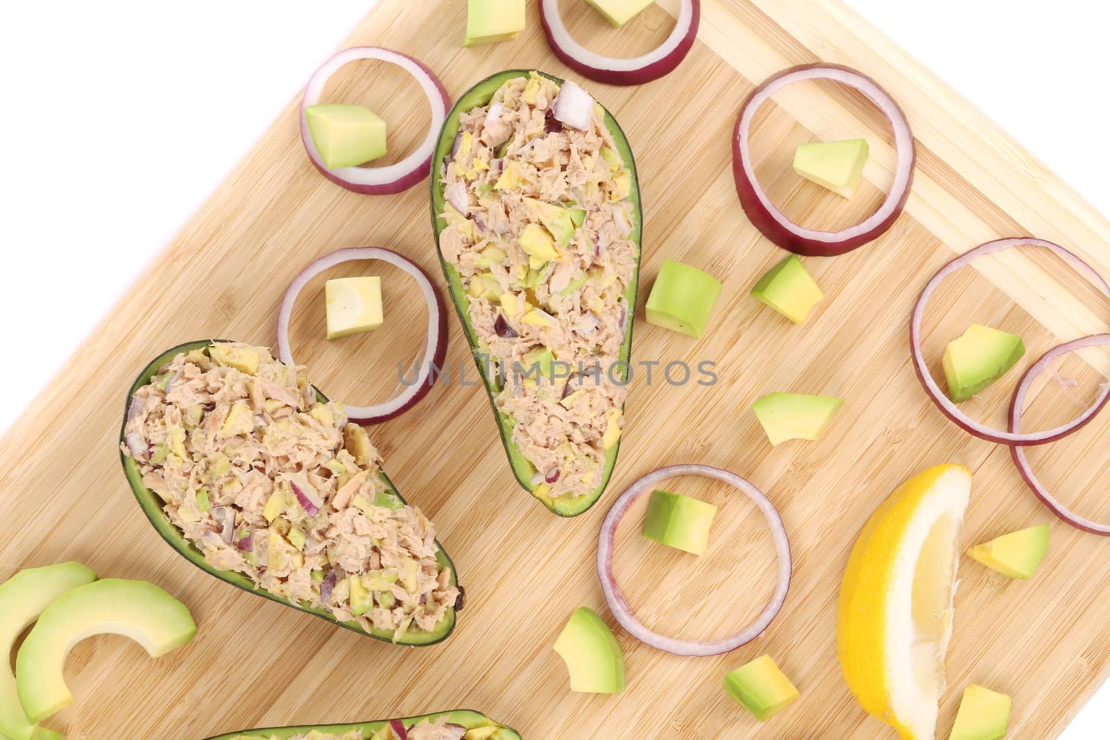 Avocado salad with tuna. Isolated on a white background.