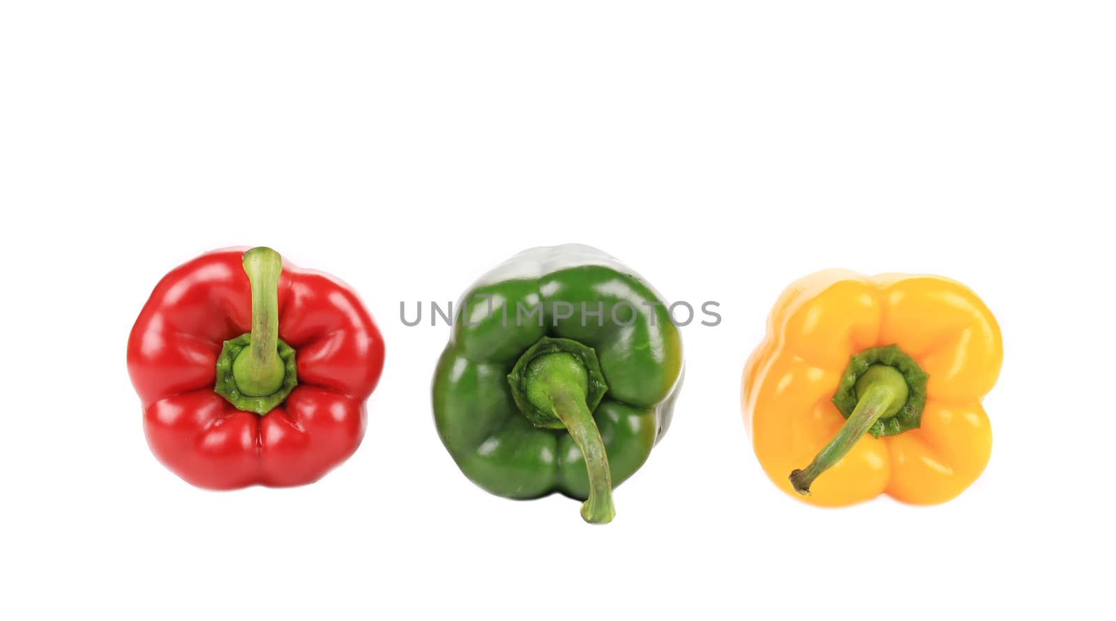 Three beautiful bell peppers. Isolated on a white background.