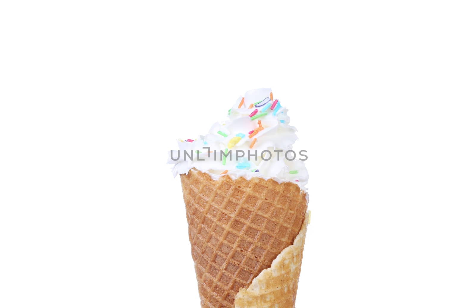 Vanilla ice cream in corn with prinkles. Isolated on a white background.