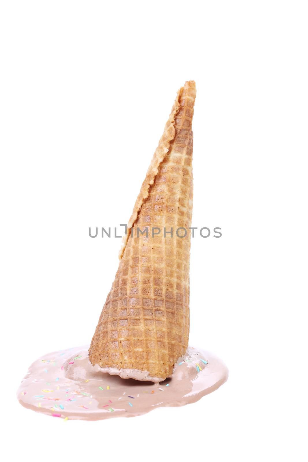 Chocolate ice cream cone fallen. Isolated on a white background.