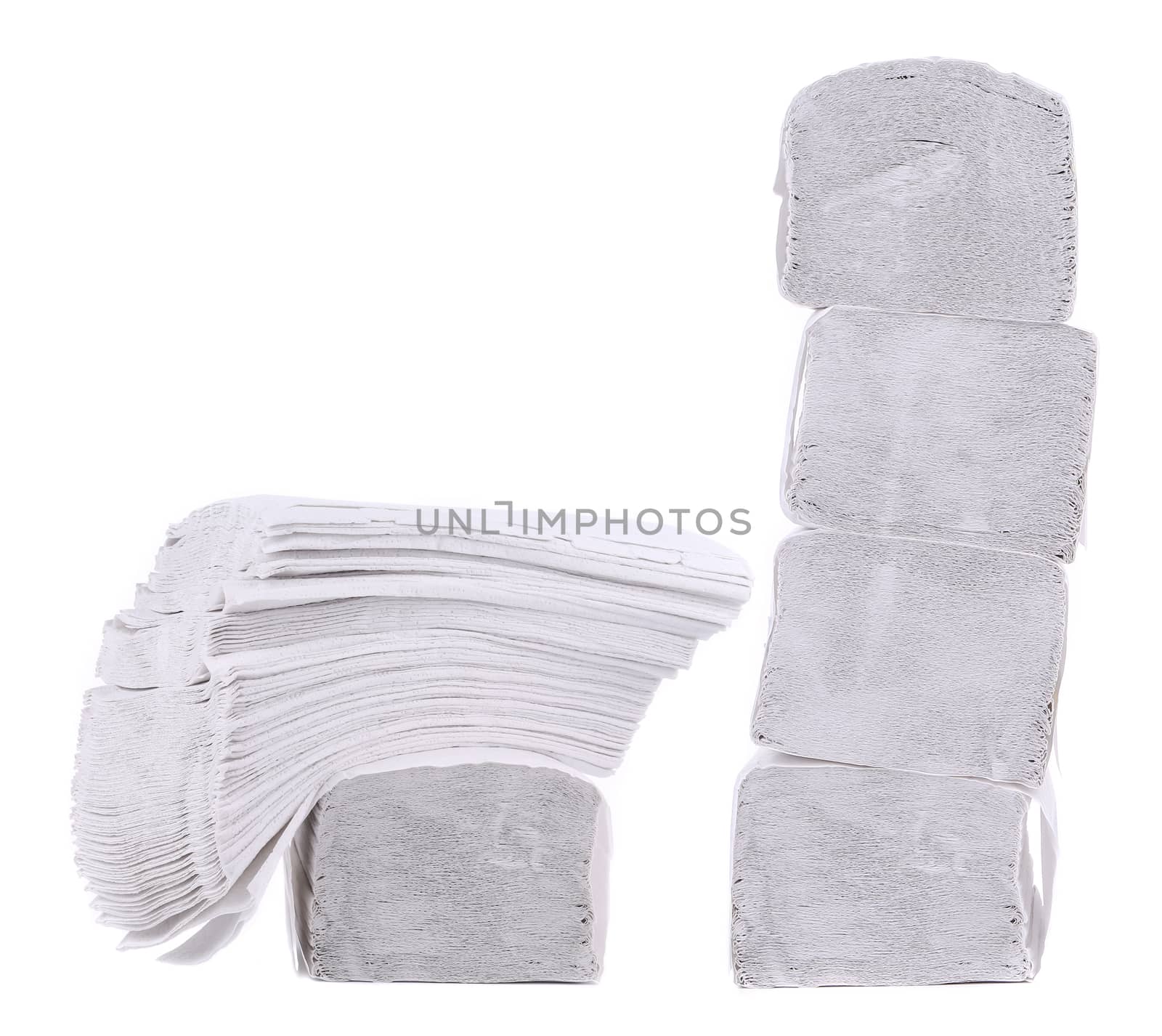 Stack of folded disposable papers. Isolated on a white background.