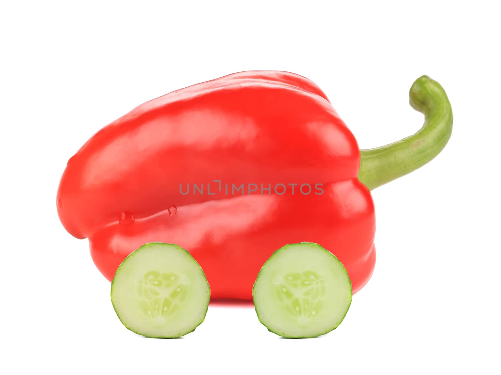 Red bell pepper like a car. Isolated on a white background.