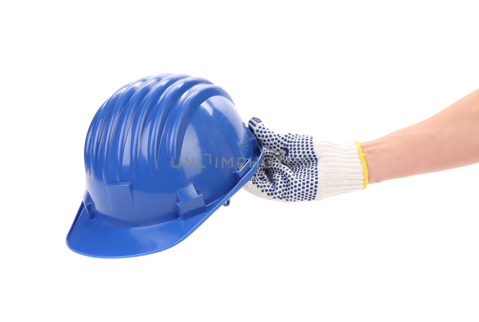 Hand holding blue helmet. Isolated on a white background.