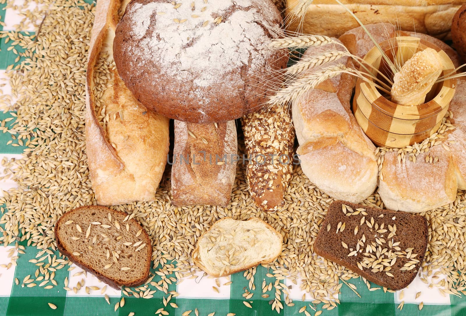 Composition of breads and wheat. To be used as background.