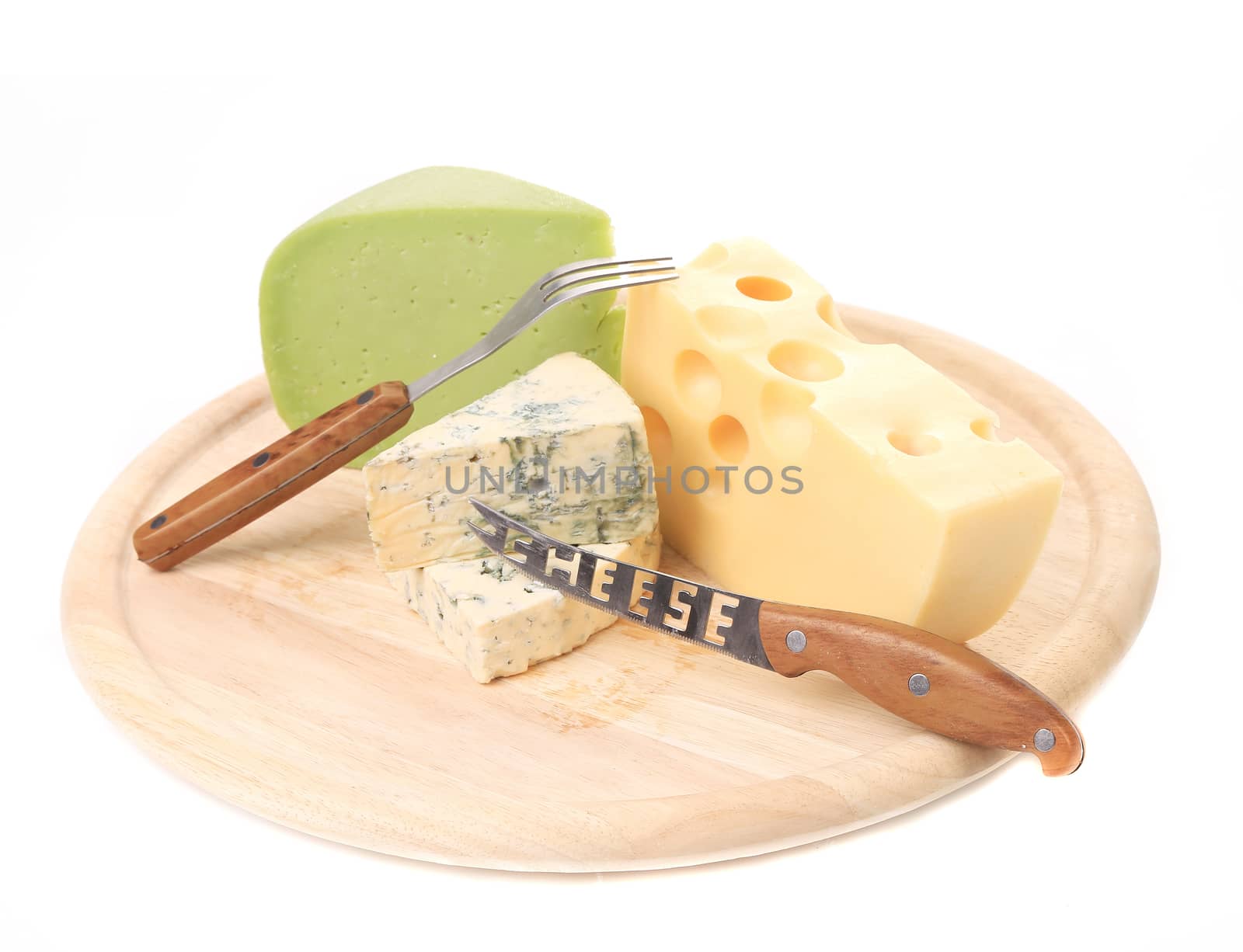 Various types of cheeses on wood. Isolated on a white background.
