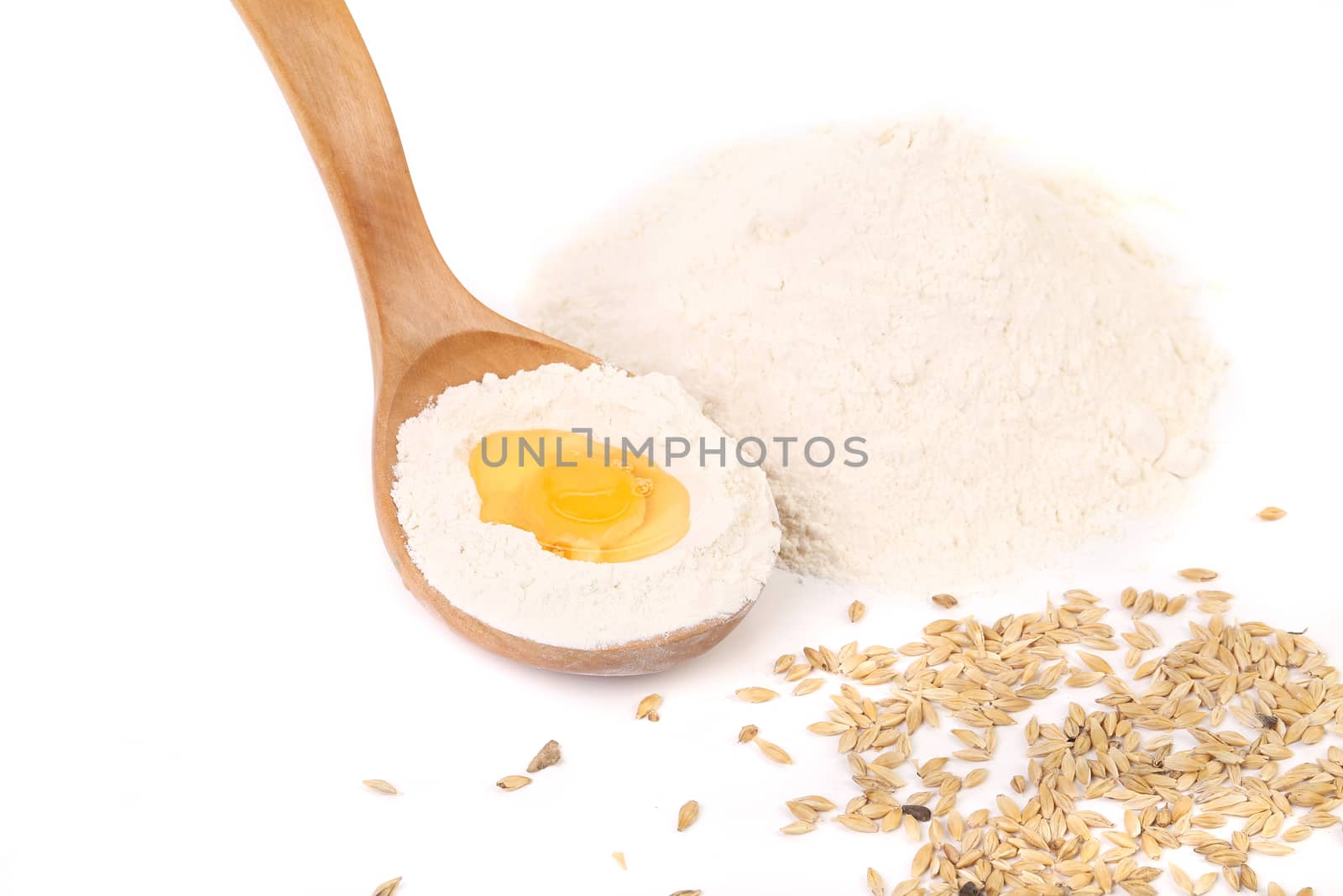 Egg and spoon. Isolated on a white background.
