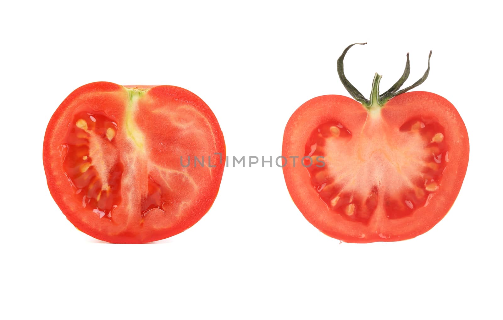 Halves of tomato. Isolated on a white background.