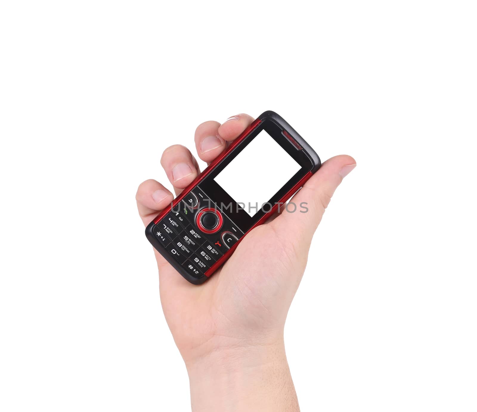 Hand holds red-black cell phone. Isolated on a white background.