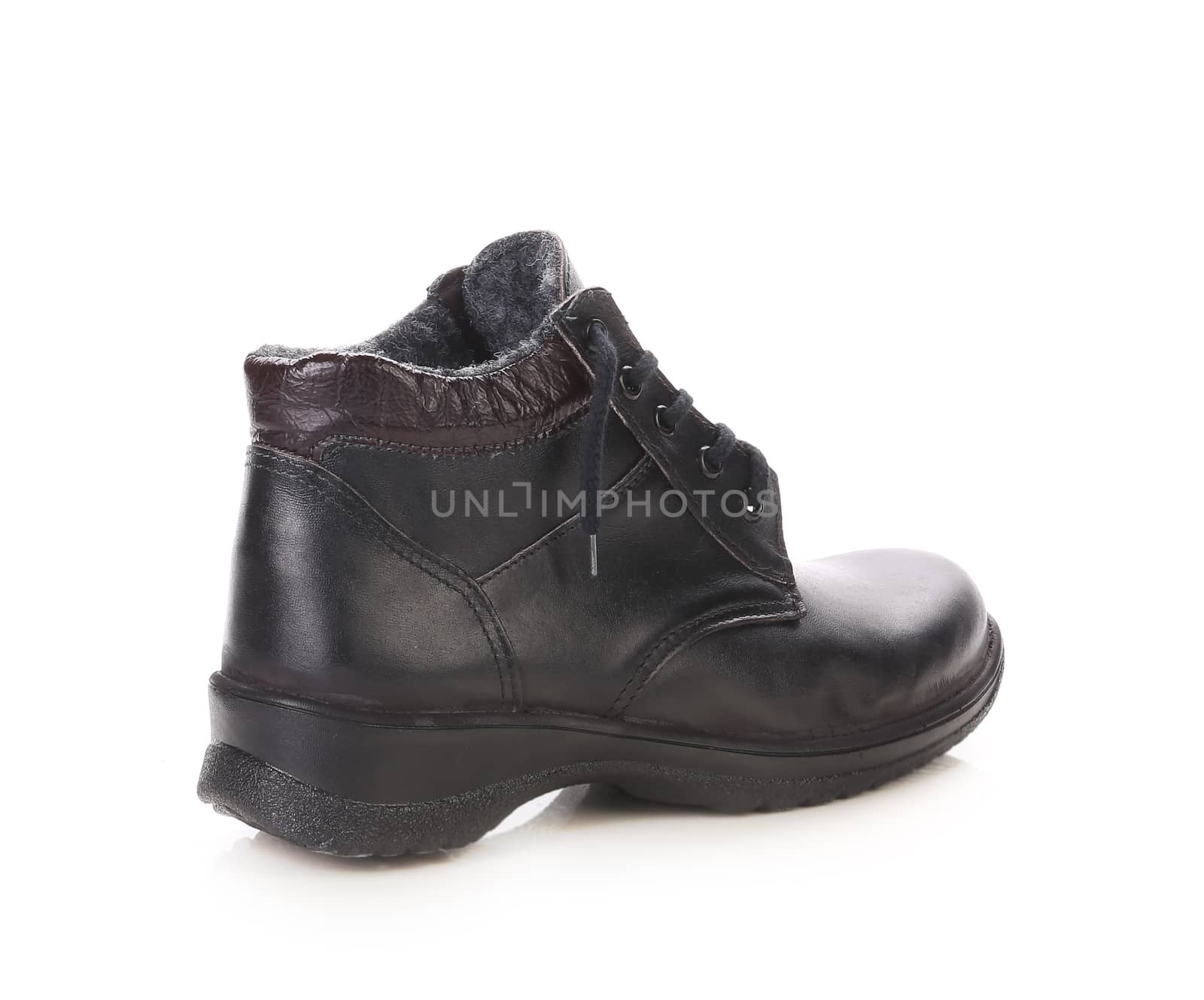 Black winter boot. Isolated on white background.