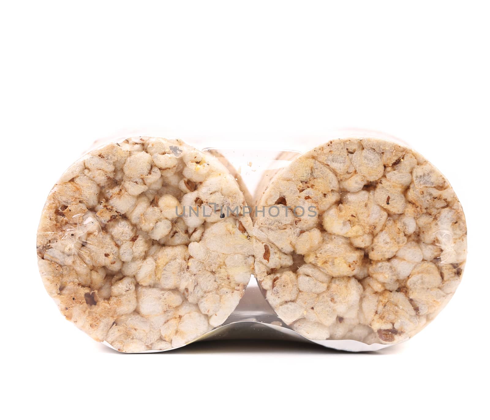 Puffed rice snack. Close up. White background.