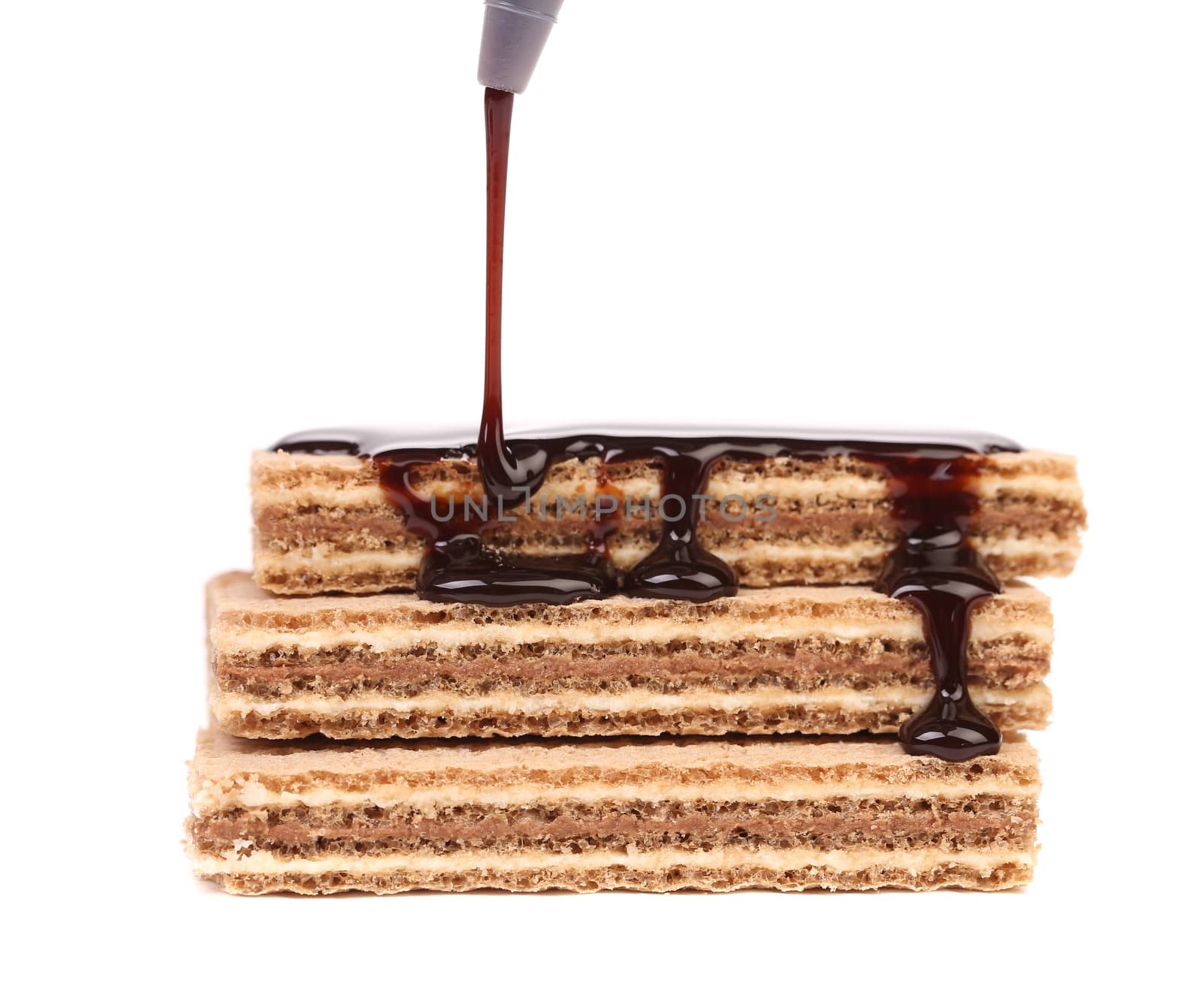 Coated stack wafers of chocolate. Isolated on a white background.