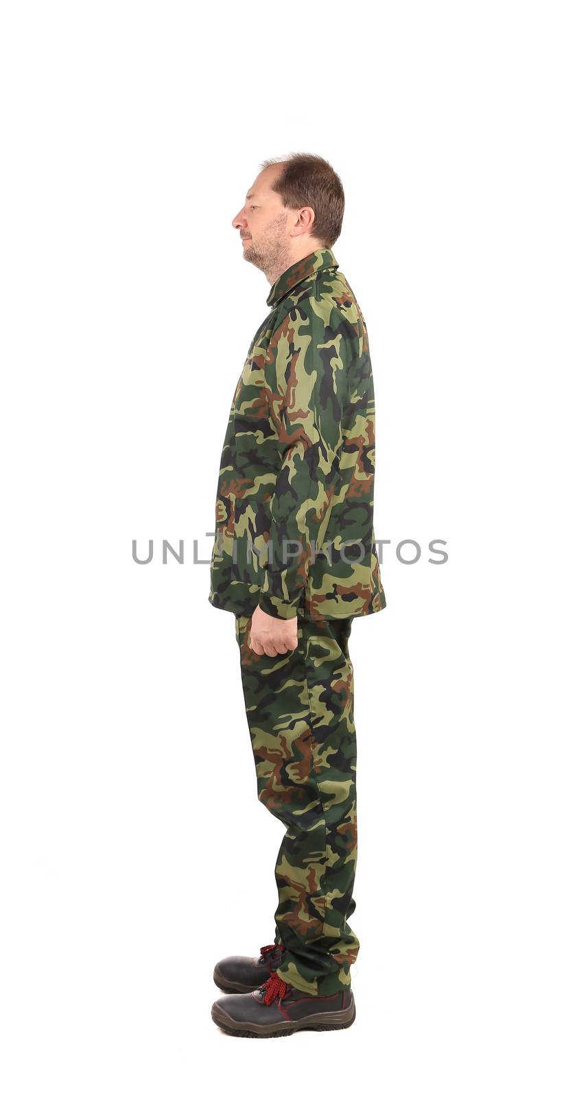 Side view of man in military suit. Isolated on a white background.