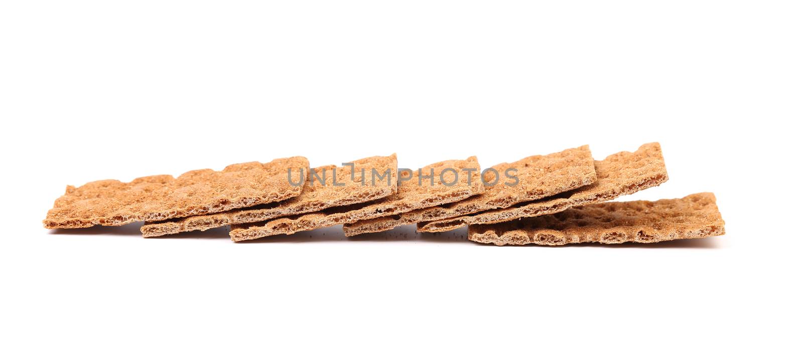 Grain crisp bread. Isolated on a white background.